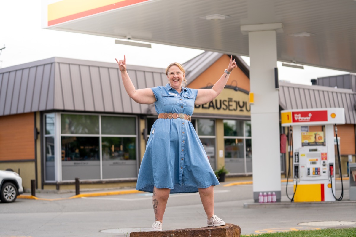 Beauséjour employee in front of the store